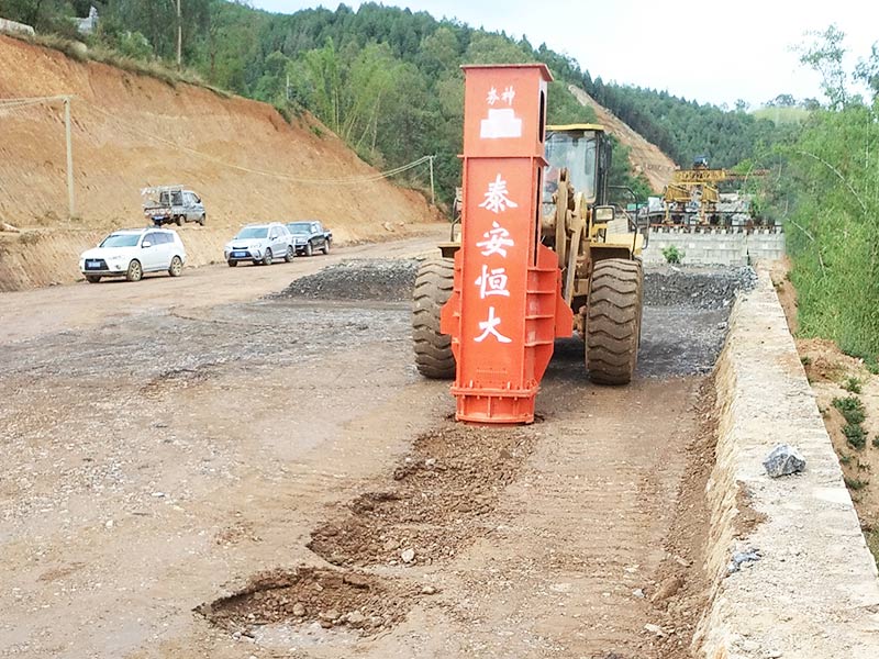 Rapid Impact Compaction mounted on loader for construction