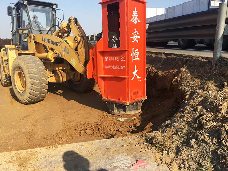 Installation of Rapid Impact Compaction on loader for construction