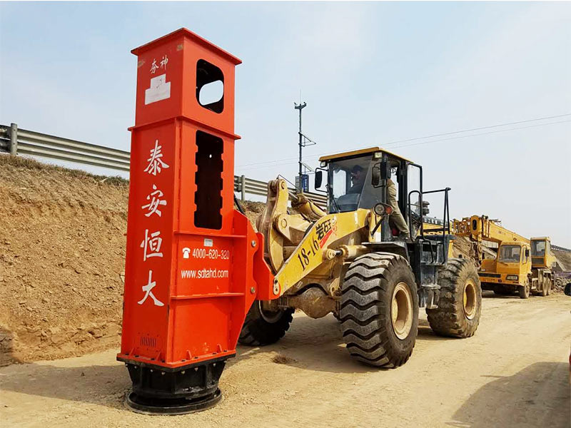 Installation of Rapid Impact Compaction on loader for construction