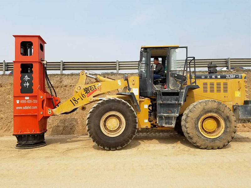 Installation of rapid impact compactor on loader for construction