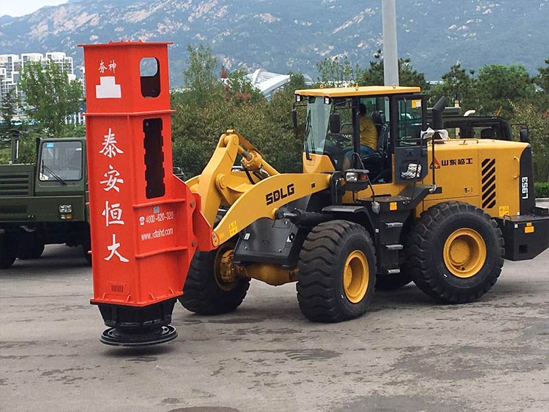 The rapid impact compactor is installed on the loader